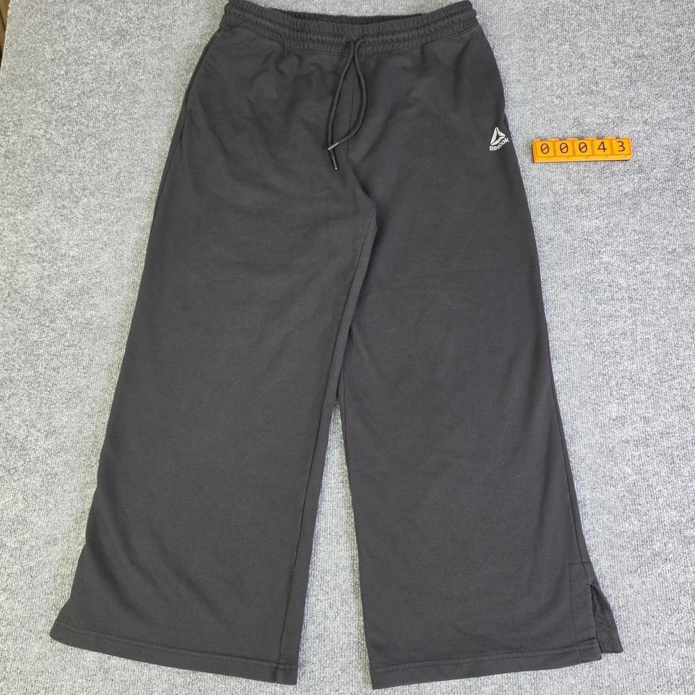 Reebok black baggy sweatpants with drawstring waist and pockets, size XXL
